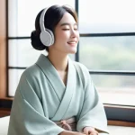 자기 수용 훈련 영상 추천 - **Prompt:** A young Japanese woman, fully clothed in comfortable, soft-colored attire, sits peaceful...